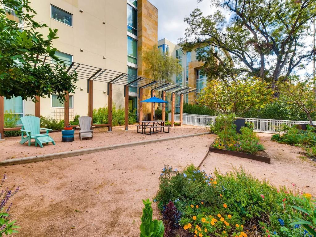 1600 Barton Springs Road, Unit 5208 Austin, TX 78704 - Photo 10 of 11 a view of a street with houses on both side