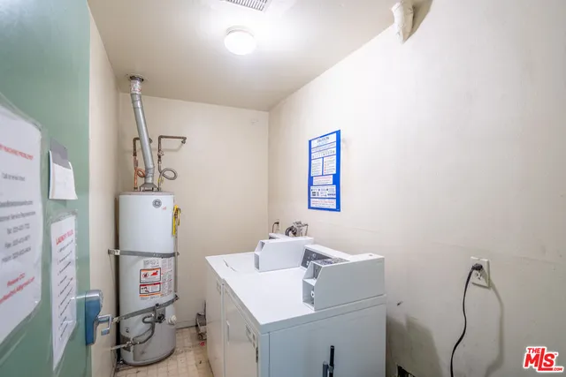 a bathroom with a sink vanity and mirror