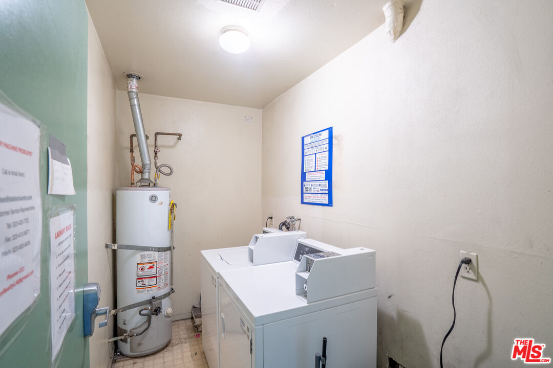820 South St Andrews Place, Unit 304 Los Angeles, CA 90005 - Photo 15 of 16 a bathroom with a sink vanity and mirror