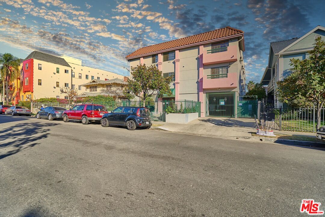 820 South St Andrews Place, Unit 304 Los Angeles, CA 90005 - Photo 16 of 16 a view of street with parked cars