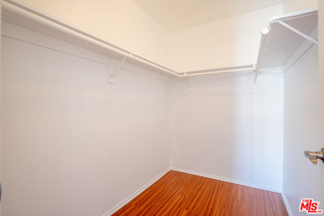 820 South St Andrews Place, Unit 304 Los Angeles, CA 90005 - Photo 8 of 16 a view of a room with wooden floor