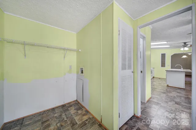 a view of a bathroom with a glass door shower