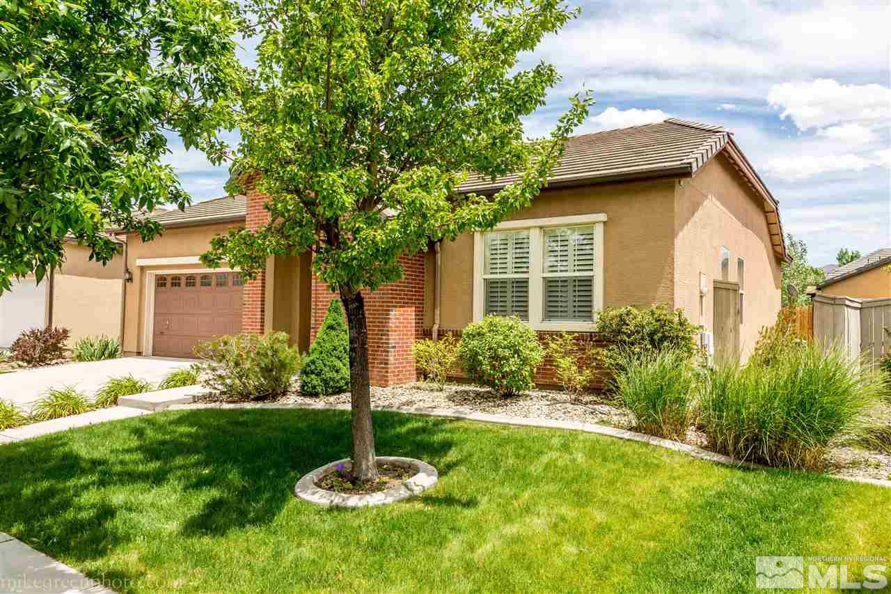 10564 Bliss Court Reno, NV 89521 - Photo 1 of 1 a front view of a house with a yard