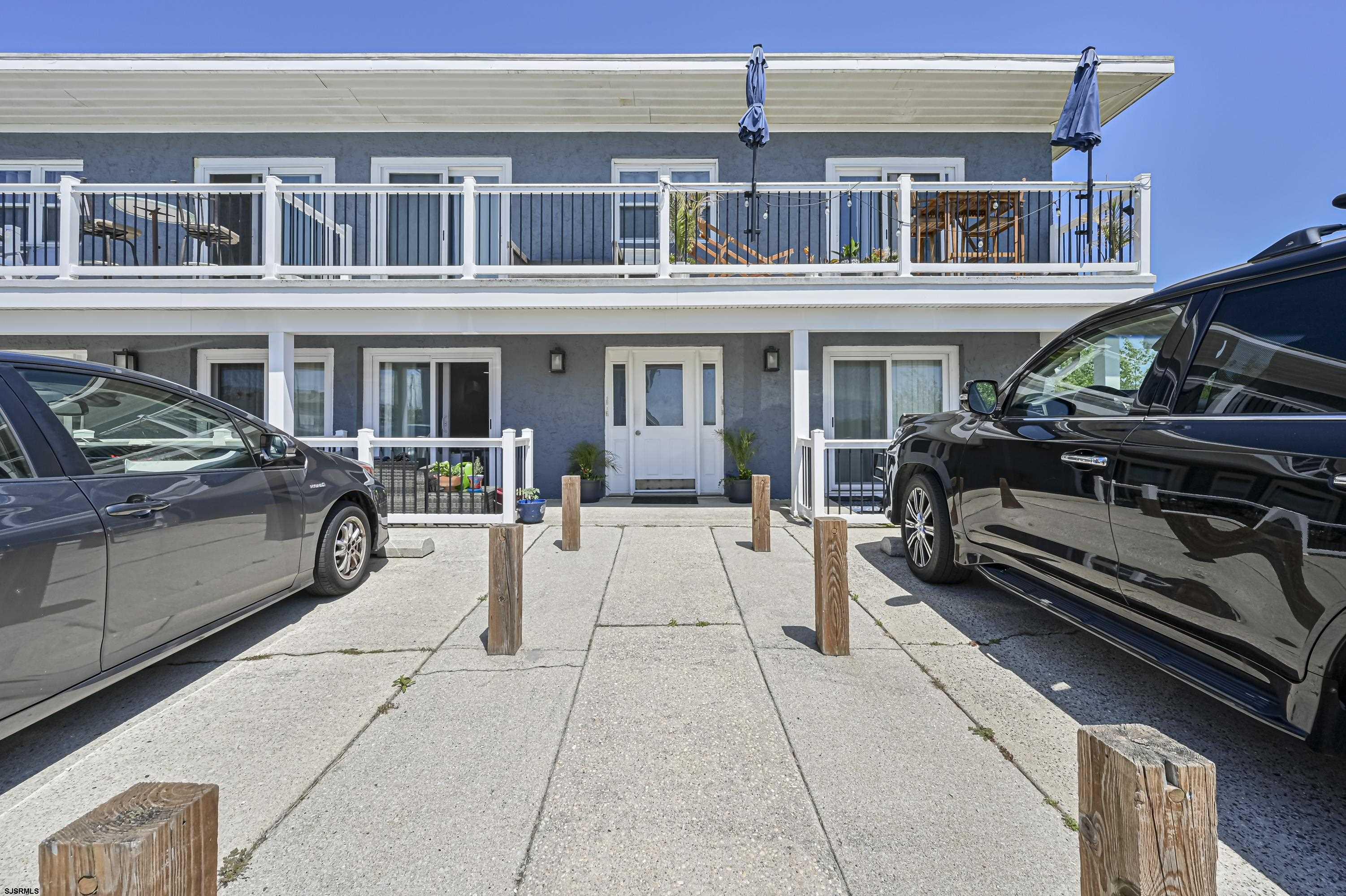 401 37th Street South, Unit 6 Brigantine, NJ 08203 - Photo 1 of 31 a view of a building with sitting area