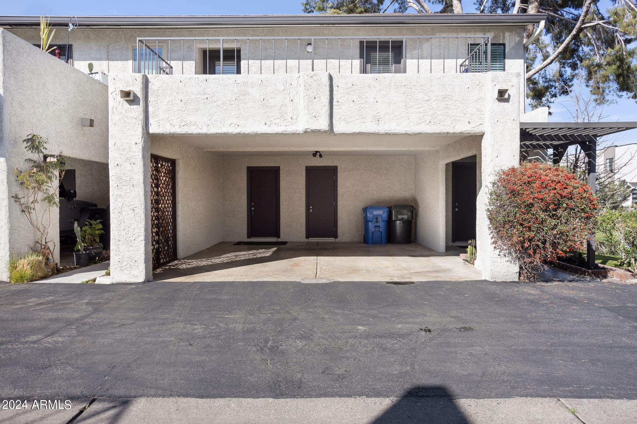 3136 North 38th Street, Unit 1 Phoenix, AZ 85018 - Photo 31 of 42 Double carport! Entry to kitchen.