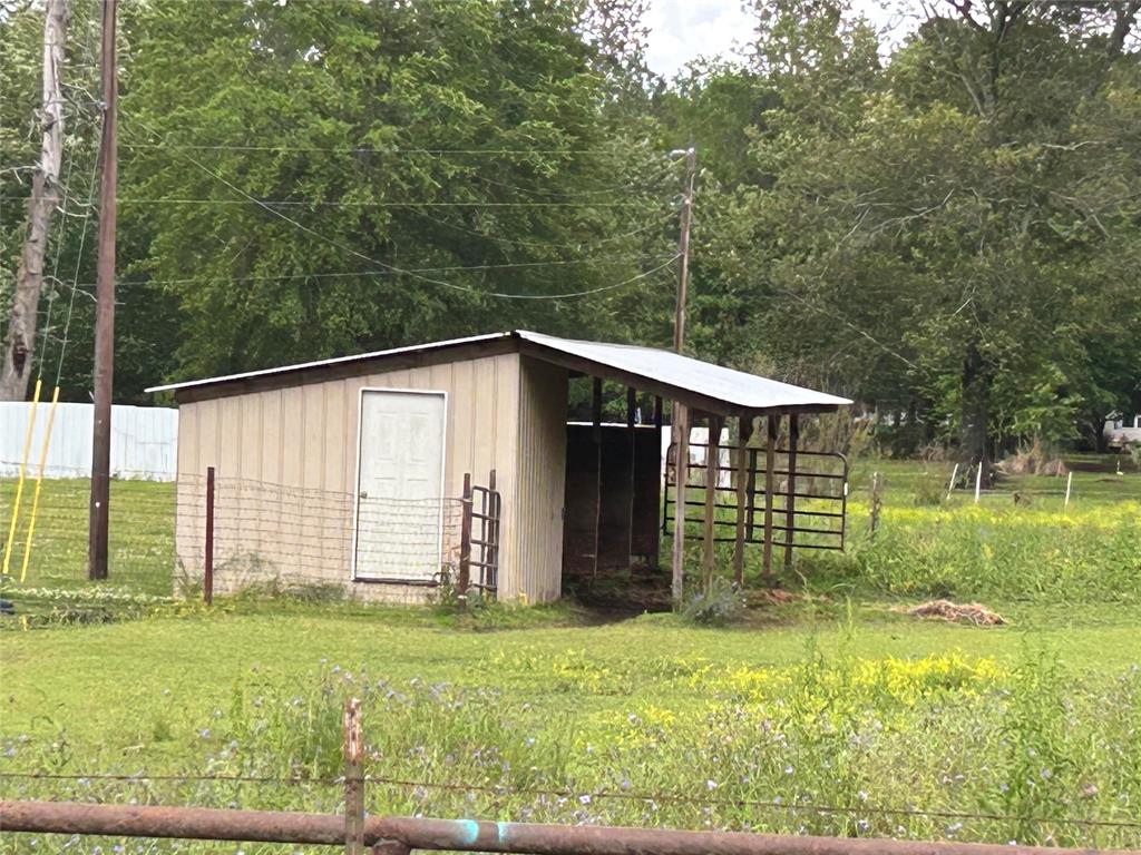 0 Woolworth Road Shreveport, LA 71129 - Photo 5 of 5 a backyard of a house with lots of green space