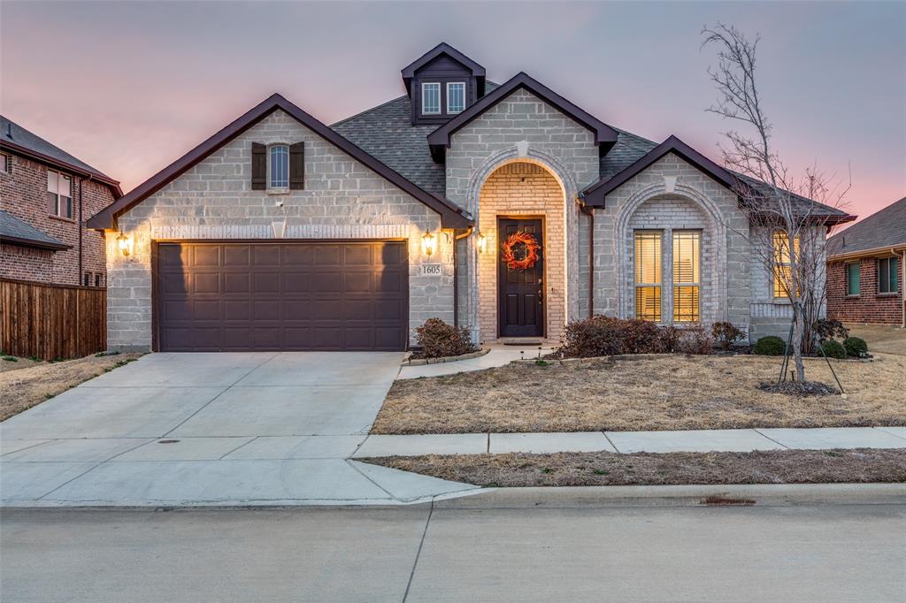 1605 George Lane Little Elm, TX 75068 - Photo 2 of 25 a front view of a house