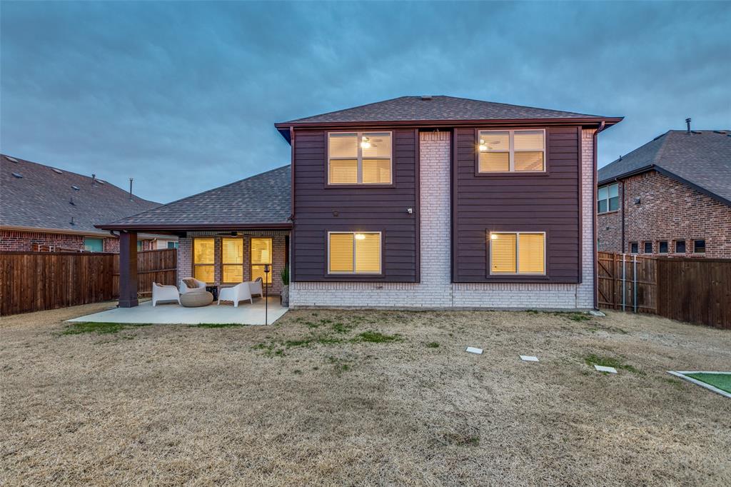 1605 George Lane Little Elm, TX 75068 - Photo 25 of 25 a view of a house with backyard and entertaining space