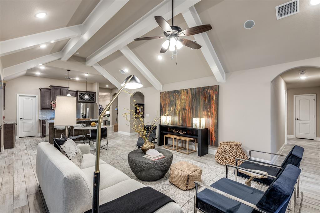 1605 George Lane Little Elm, TX 75068 - Photo 8 of 25 a living room with furniture and chandelier