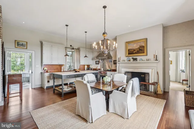 a spacious bedroom with a bed and a couch