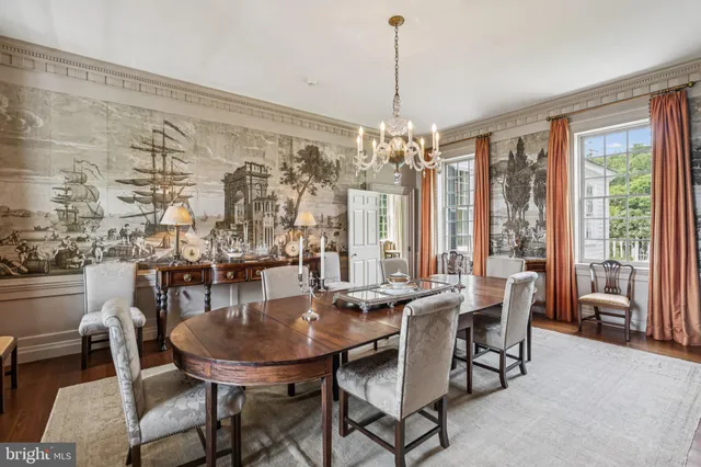 a spacious bathroom with a granite countertop sink toilet a mirror and a shower