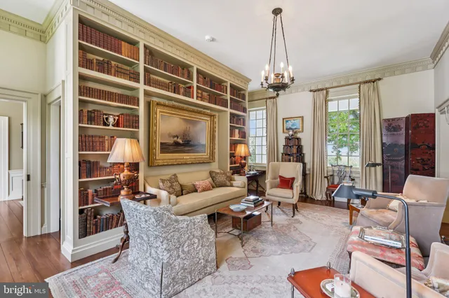 a bathroom with a sink a mirror a vanity and a shower