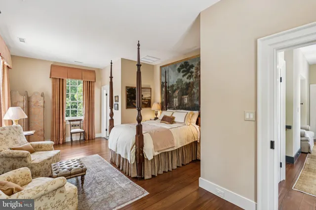 a view of a chairs and table in backyard