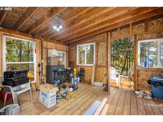 a view of house with backyard and garden