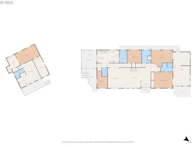 a aerial view of a house with swimming pool and trees