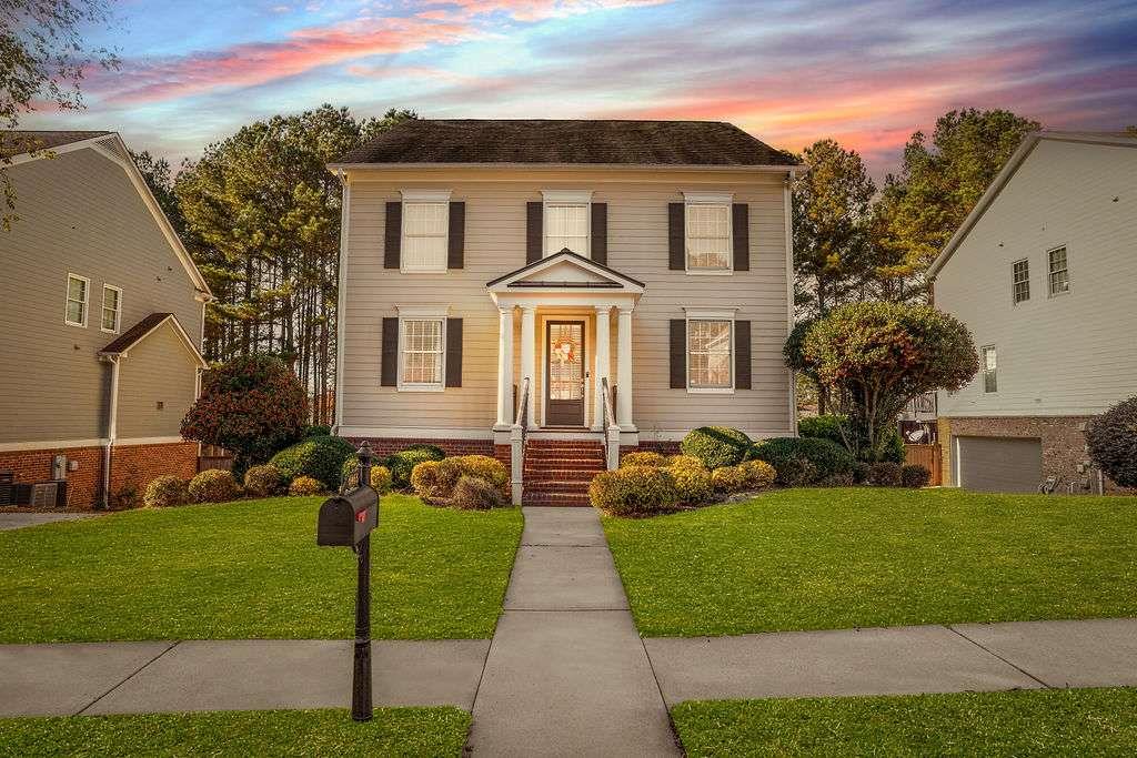 6463 Century Park Place Southeast Mableton, GA 30126 - Photo 41 of 42 a front view of a house with garden
