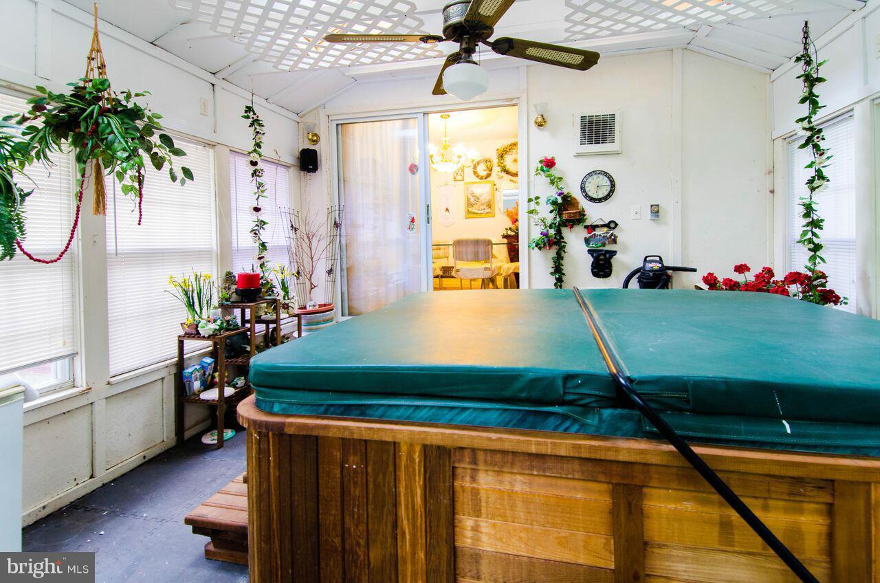 8011 Stillbrooke Road Manassas, VA 20112 - Photo 24 of 30 Sun Room with hot tub