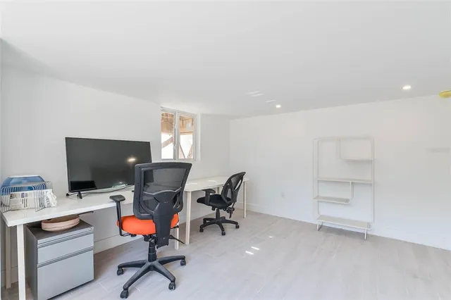 a view of a workspace with furniture