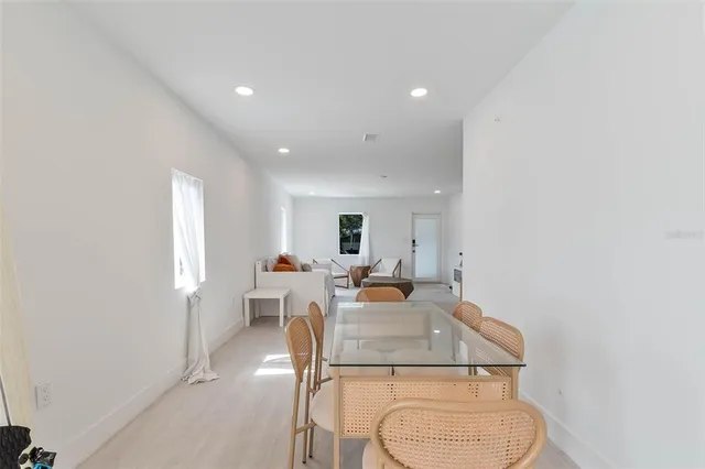 a view of a dining room with furniture