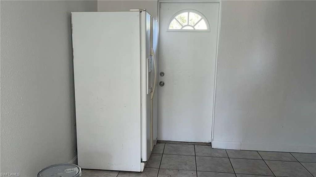 216 Maria Street Fort Myers, FL 33916 - Photo 13 of 19 a view of empty room with window