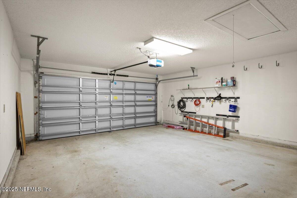 1385 Soaring Flight Way Jacksonville, FL 32225 - Photo 34 of 34 a view of a garage with furniture