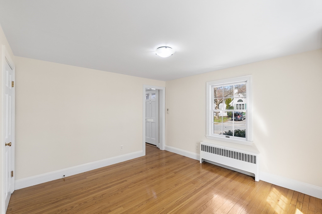 10 Ellison Road Lexington, MA 02421 - Photo 8 of 35 a view of a room with wooden floor and window