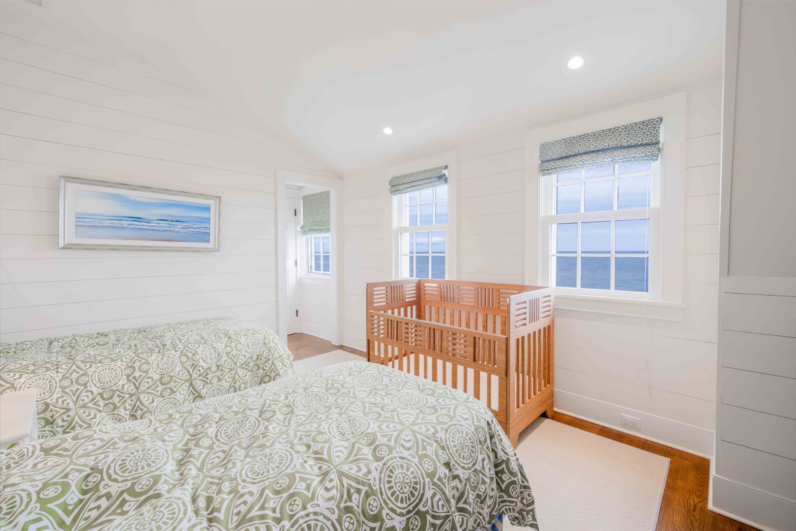 15 Hallowell Lane Nantucket, MA 02554 - Photo 12 of 22 a bedroom with a bed and wooden floor