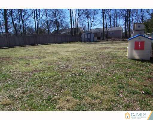 33 Highland Road Colonia, NJ 07067 - Photo 10 of 10 a view of a backyard