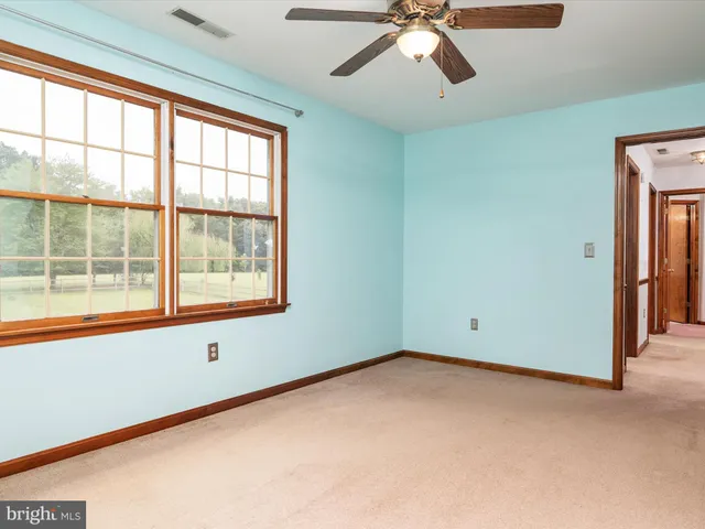 an empty room with a window