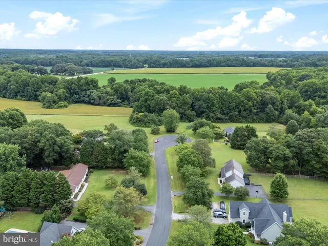 a view of lake with green space