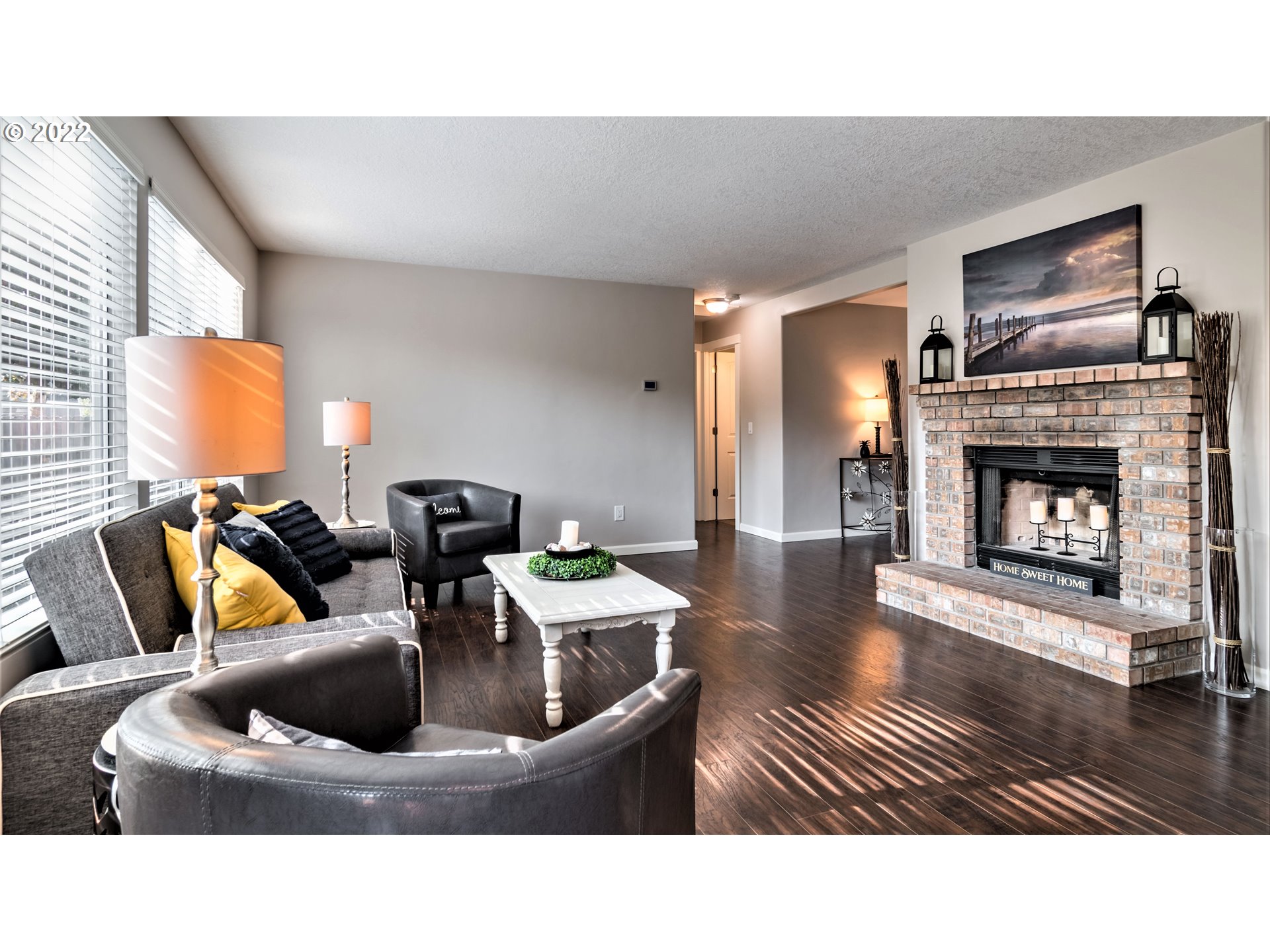 4467 Holly Street Springfield, OR 97478 - Photo 11 of 32 a living room with furniture and a fireplace