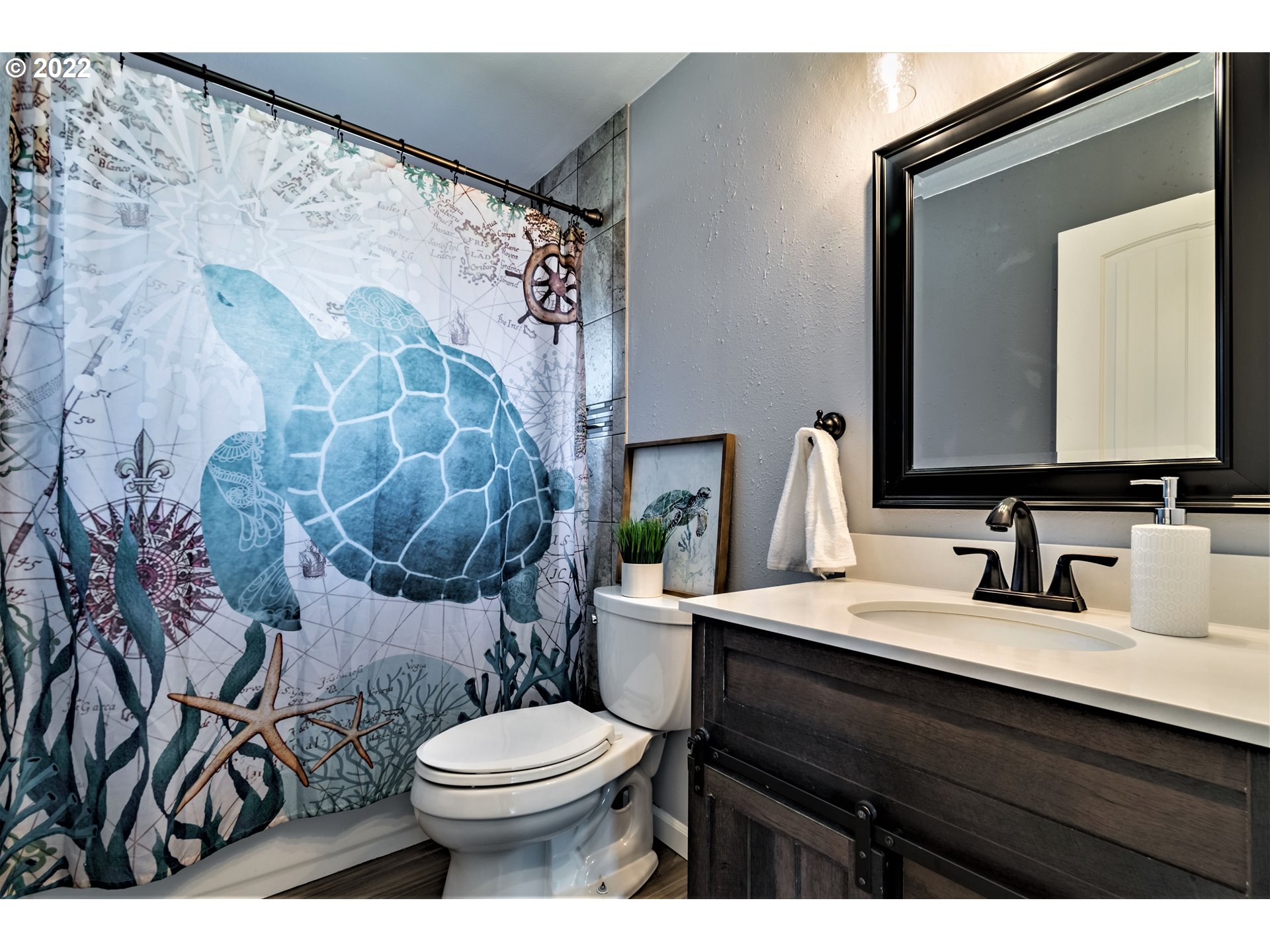 4467 Holly Street Springfield, OR 97478 - Photo 14 of 32 a bathroom with a sink and a mirror
