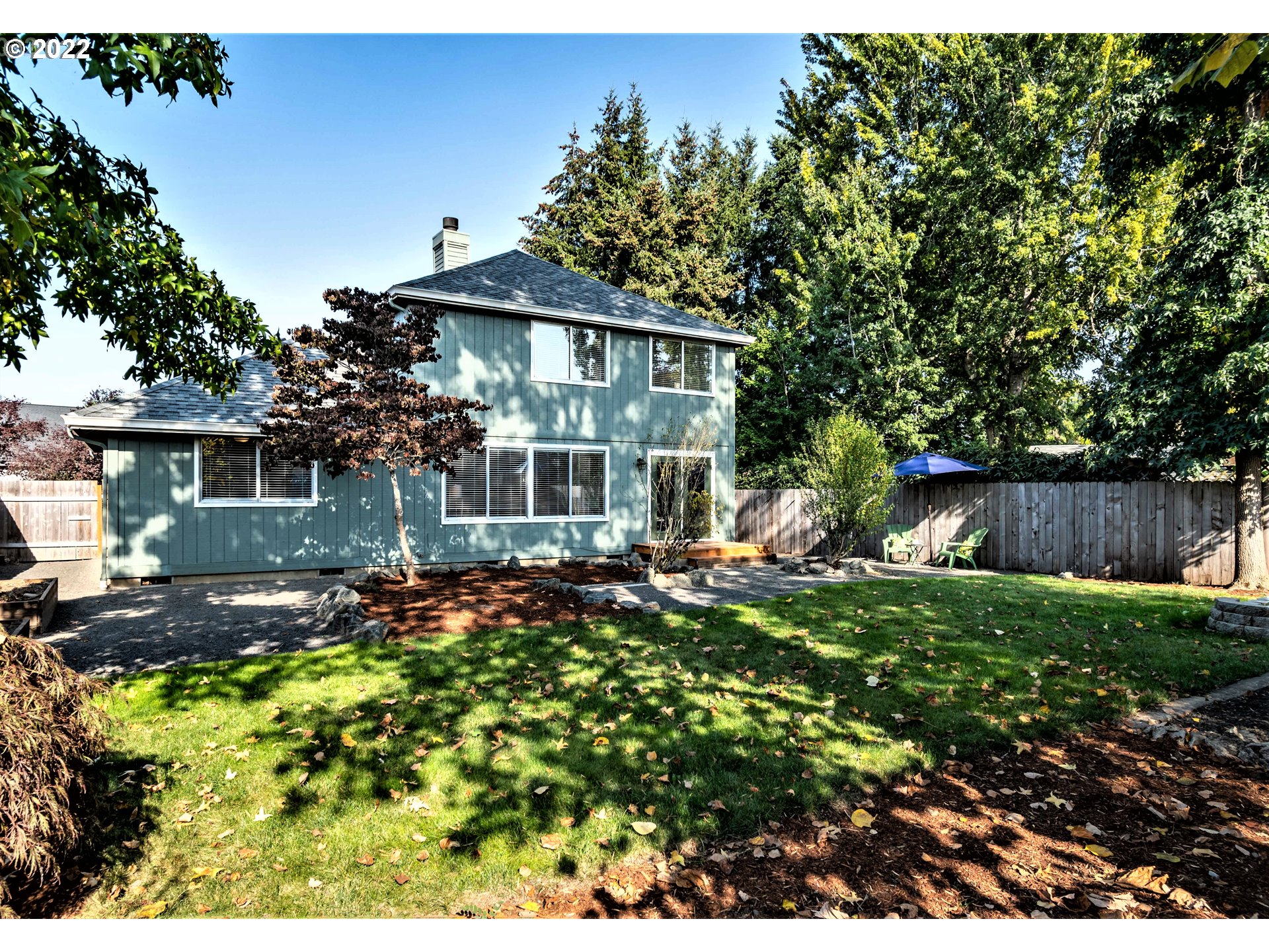 4467 Holly Street Springfield, OR 97478 - Photo 30 of 32 a front view of a house with a garden