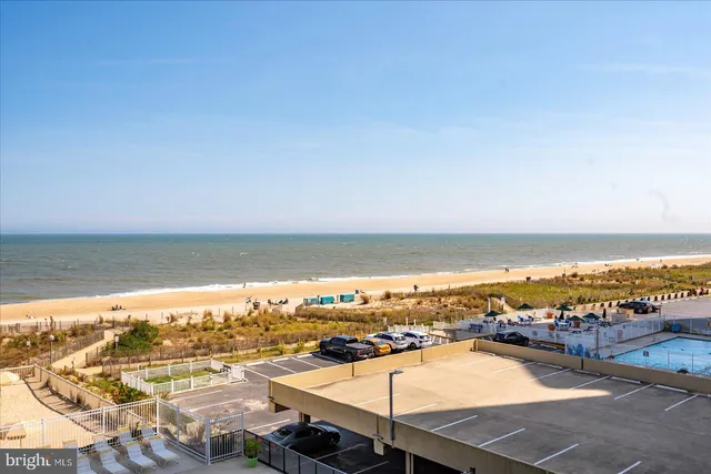 a view of an ocean and city