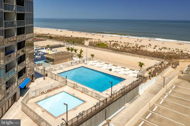 a view of a balcony with an ocean view