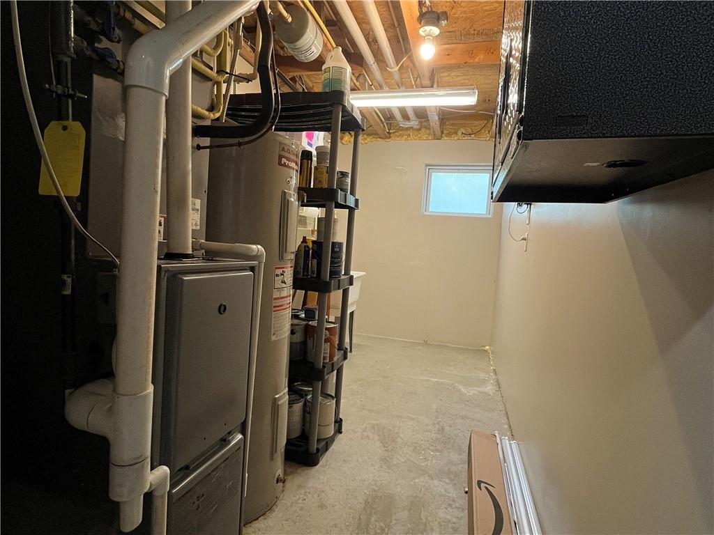 110 Lockheed Drive Coraopolis, PA 15108 - Photo 36 of 42 Utility room with high efficiency furnace and perfect for storing bulky items such as bicycles or sports equipment.