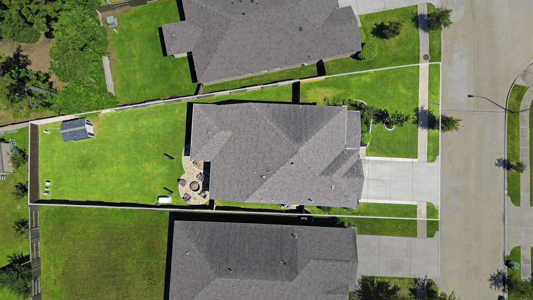 4334 Umber Shadow Drive Spring, TX 77386 - Photo 42 of 45 Top-down aerial view highlights the home's generous lot size, expansive backyard, and covered outdoor living area.