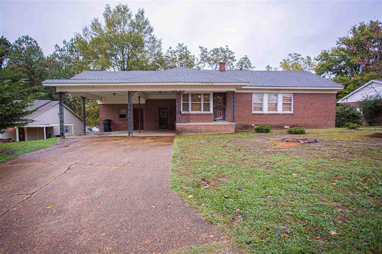 225 Anthony Street Ripley, TN 38063 - Photo 1 of 19 a view of a house with a yard and large tree