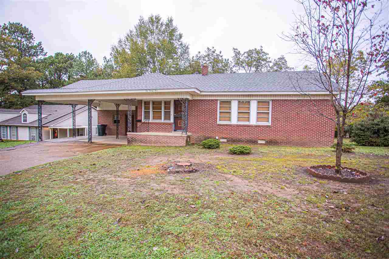 225 Anthony Street Ripley, TN 38063 - Photo 2 of 19 front view of a house with a yard