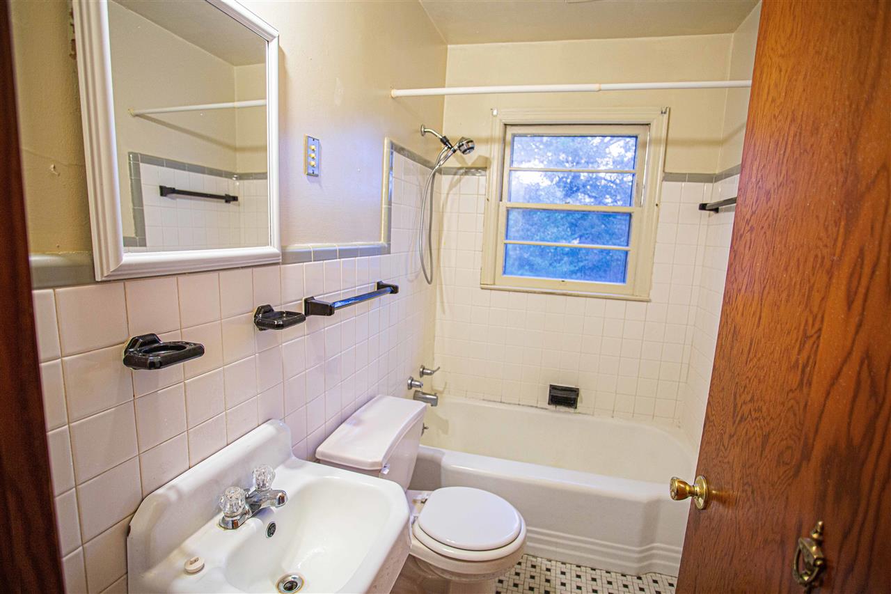 225 Anthony Street Ripley, TN 38063 - Photo 15 of 19 a bathroom with a sink toilet and shower