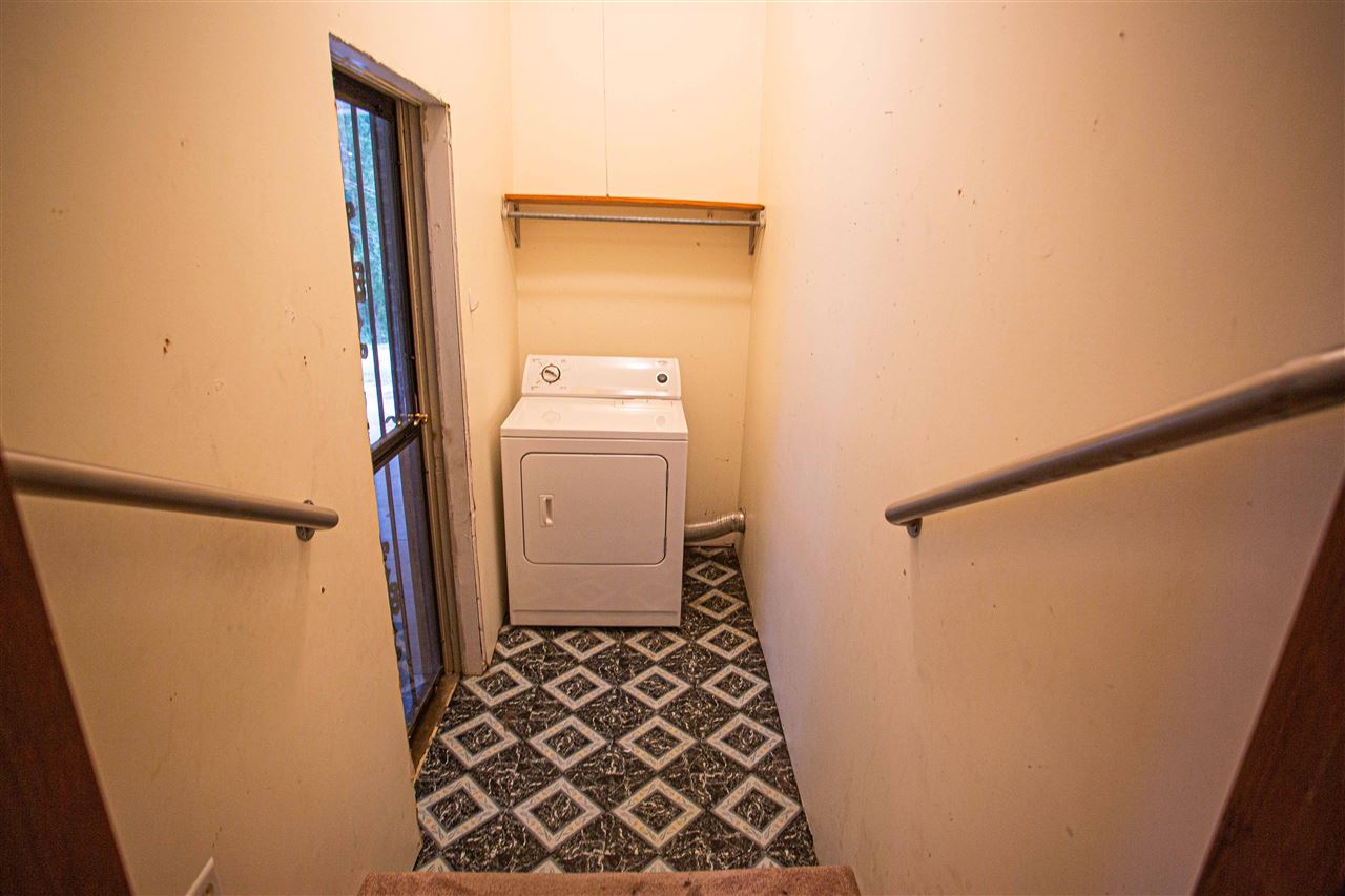 225 Anthony Street Ripley, TN 38063 - Photo 16 of 19 a bathroom with a sink and a shower