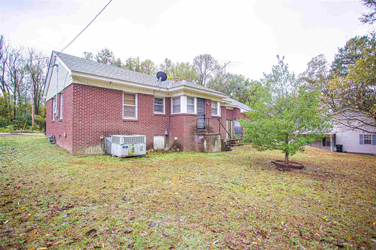 225 Anthony Street Ripley, TN 38063 - Photo 18 of 19 a view of a house with a yard