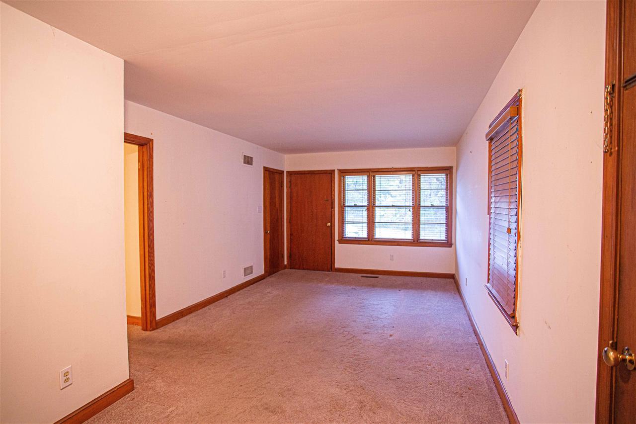 225 Anthony Street Ripley, TN 38063 - Photo 3 of 19 an empty room with windows