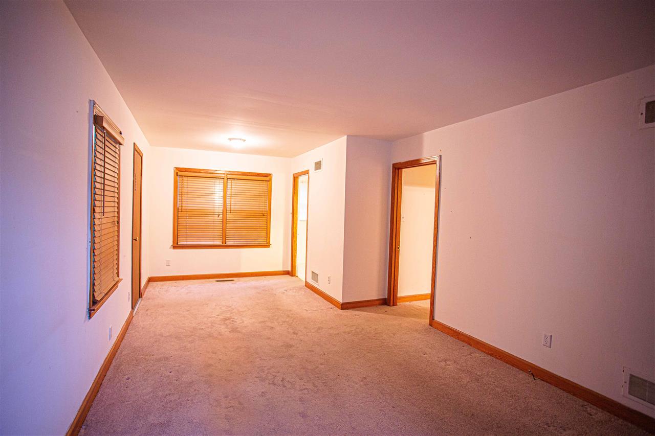 225 Anthony Street Ripley, TN 38063 - Photo 4 of 19 a view of an empty room with a window