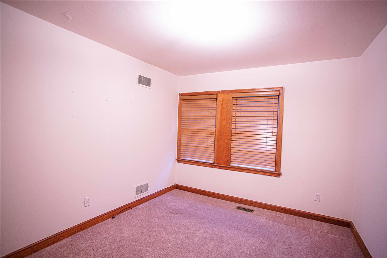 225 Anthony Street Ripley, TN 38063 - Photo 8 of 19 an empty room with a window