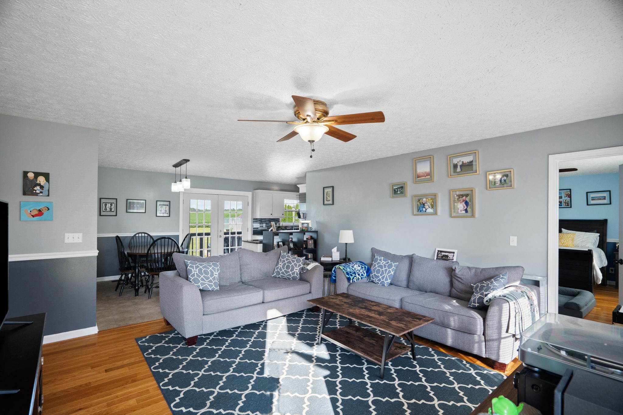 4381 Matthews Road Cedar Hill, TN 37032 - Photo 8 of 34 a living room with furniture and kitchen view