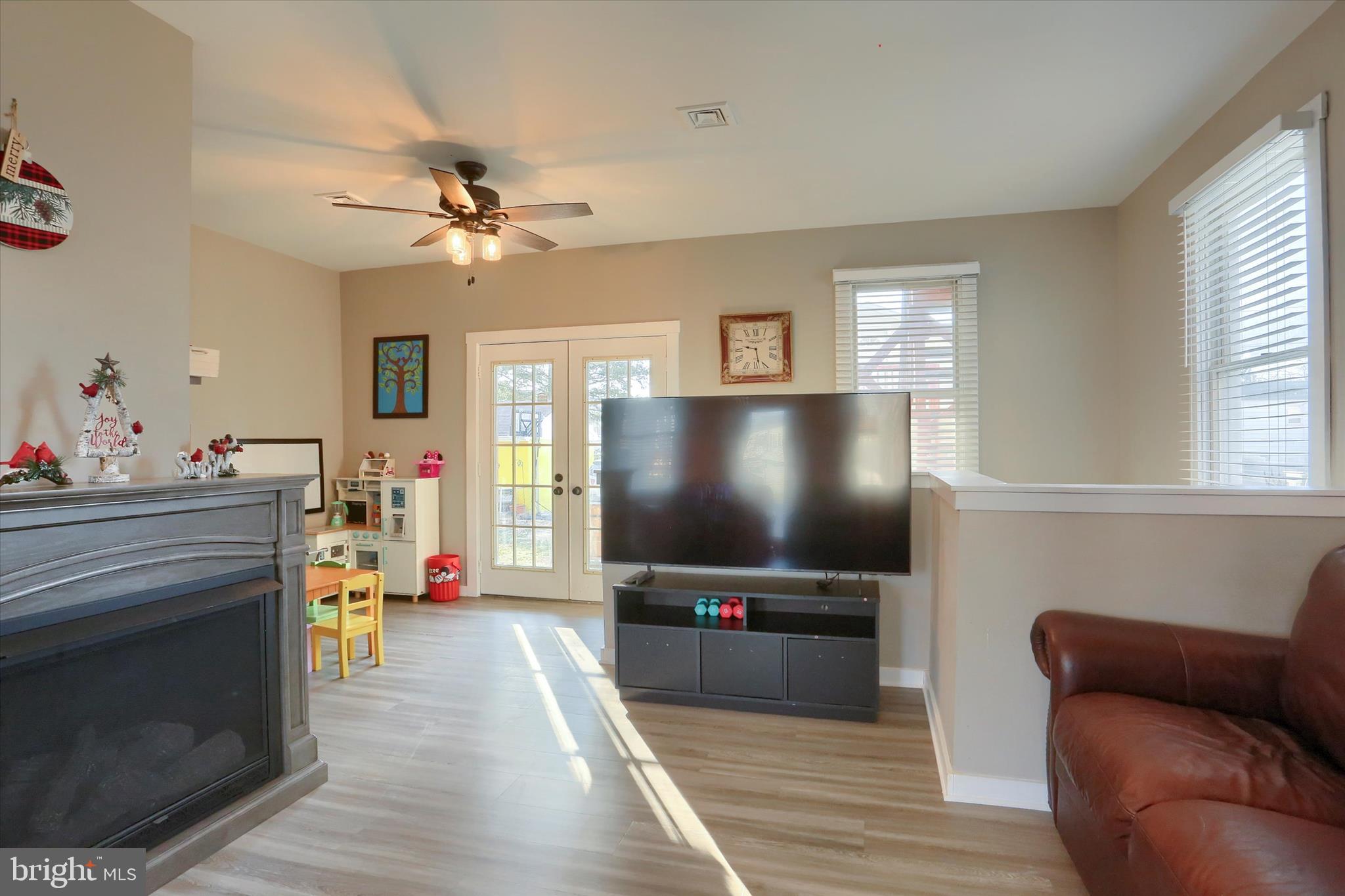 1544 Lafayette Street Lebanon, PA 17042 - Photo 16 of 49 a living room with furniture and a flat screen tv