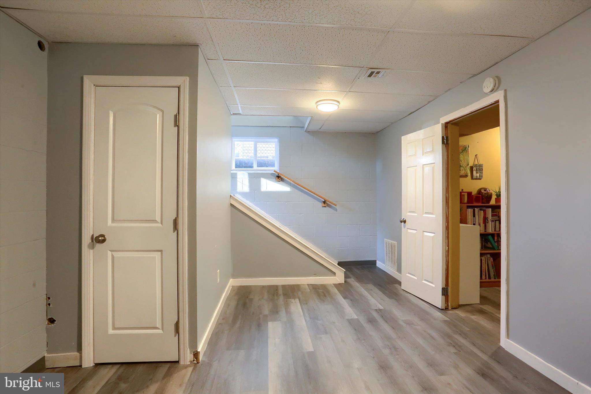 1544 Lafayette Street Lebanon, PA 17042 - Photo 19 of 49 a view of hallway with stairs and wooden floor