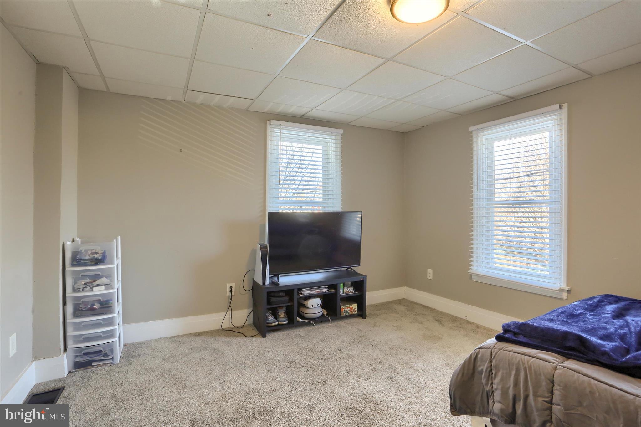1544 Lafayette Street Lebanon, PA 17042 - Photo 27 of 49 a livingroom with a window and a flat screen tv