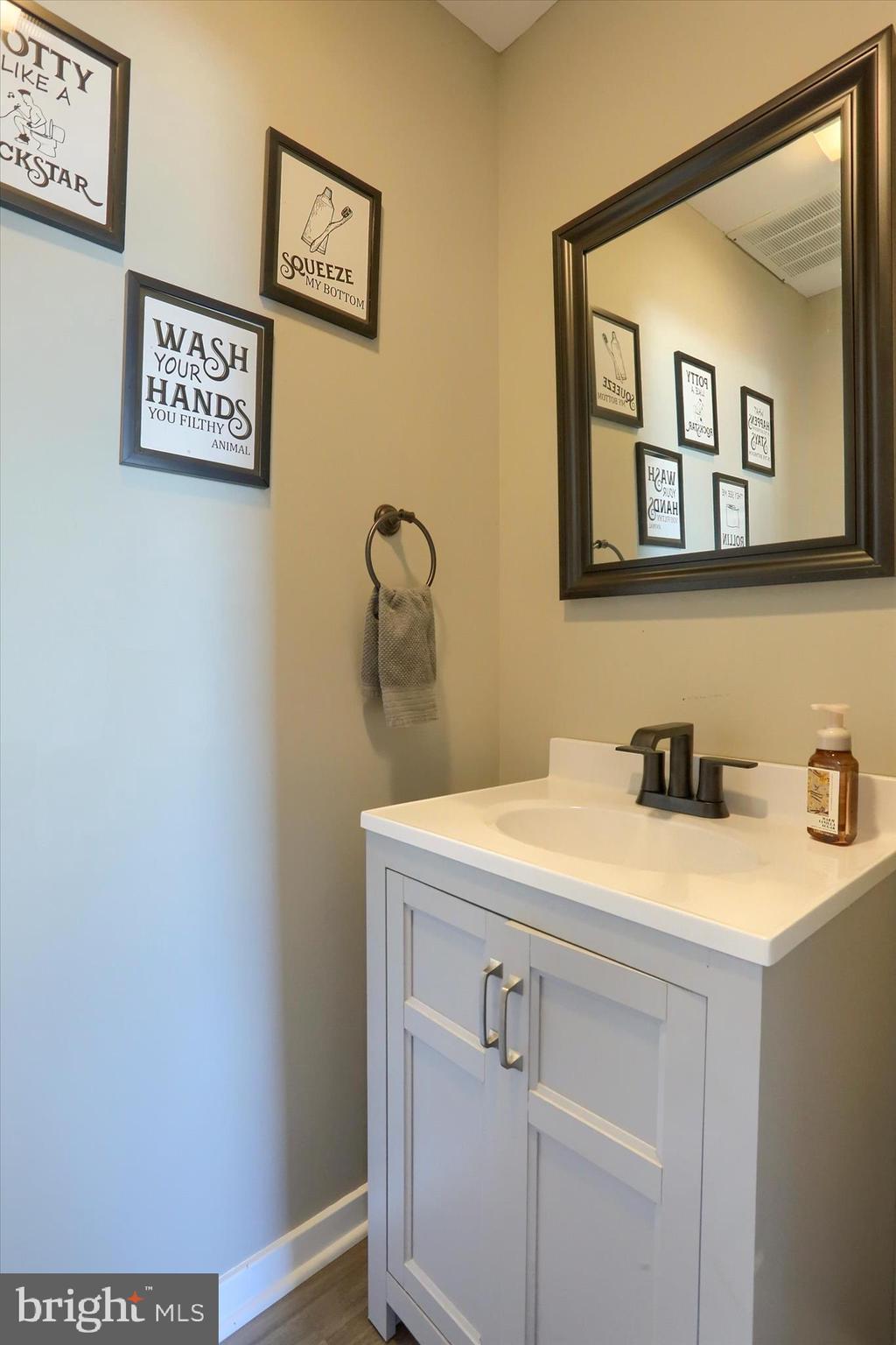 1544 Lafayette Street Lebanon, PA 17042 - Photo 6 of 49 a bathroom with a sink and a mirror